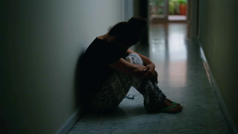 middle-age-hispanic-woman-suffering-domestic-violence-with-bruise-eyes-sitting-floor-home (1)